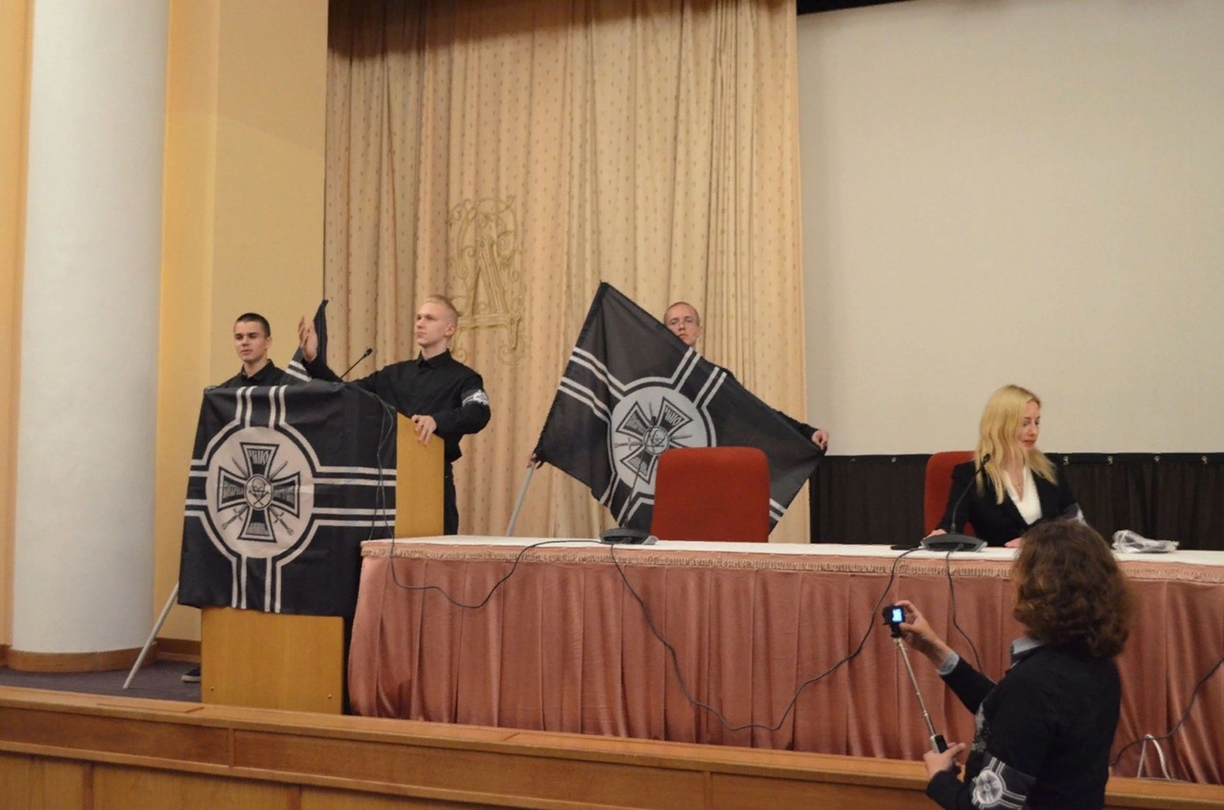 From left to right: Andrei Serbian, Andrei “Bely” Skvortsov, Andrei Yerin at an NCM conference 